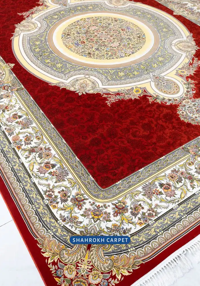 قیمت و خرید فرش ماشینی 1200 شانه زمینه زرشکی طرح هالیدی - فرش شاهرخ